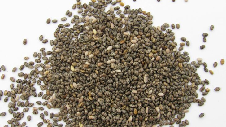 a pile of seeds on a white surface
